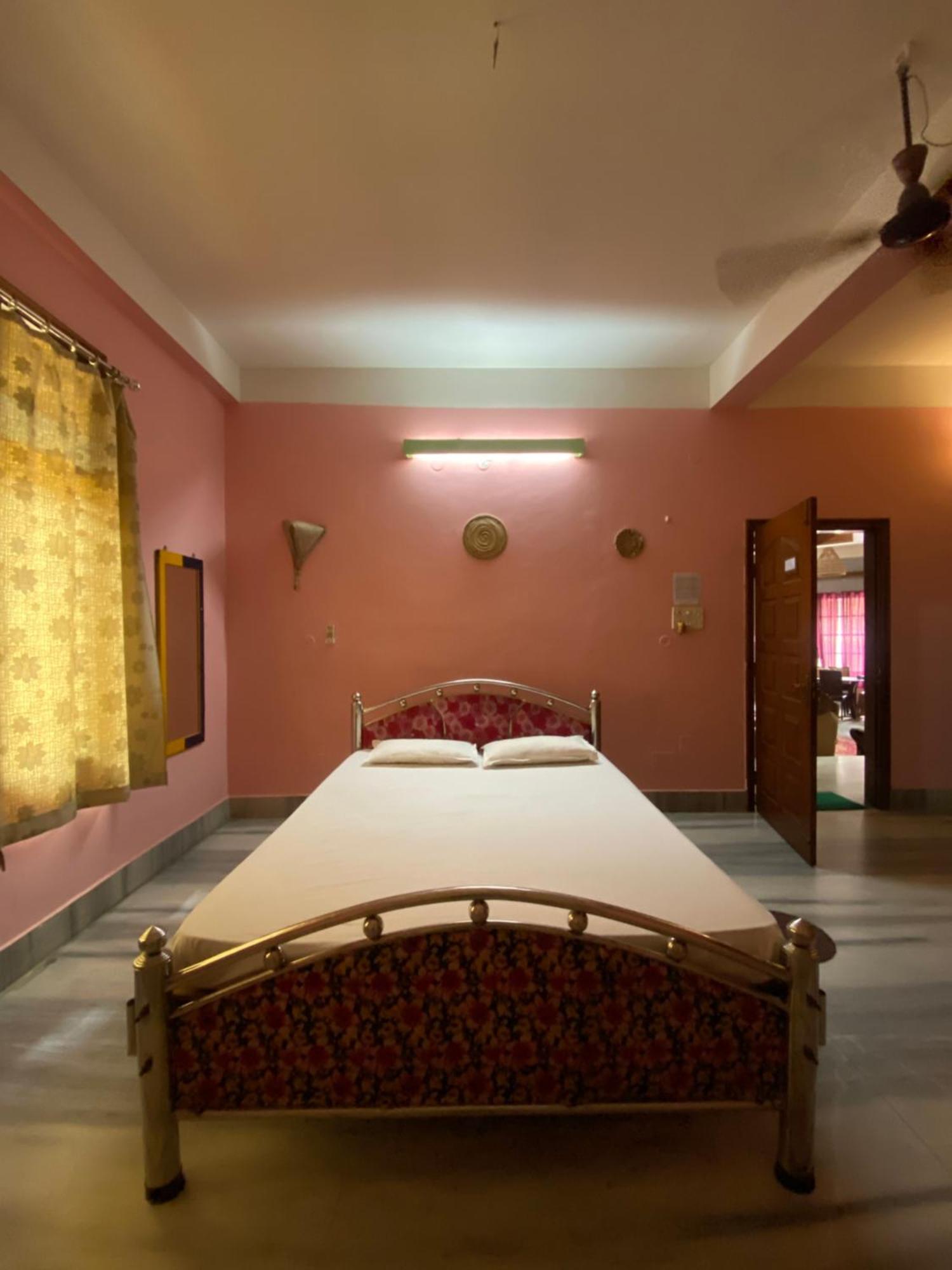 Assam Home Hostel Project Guváhátí Pokoj fotografie