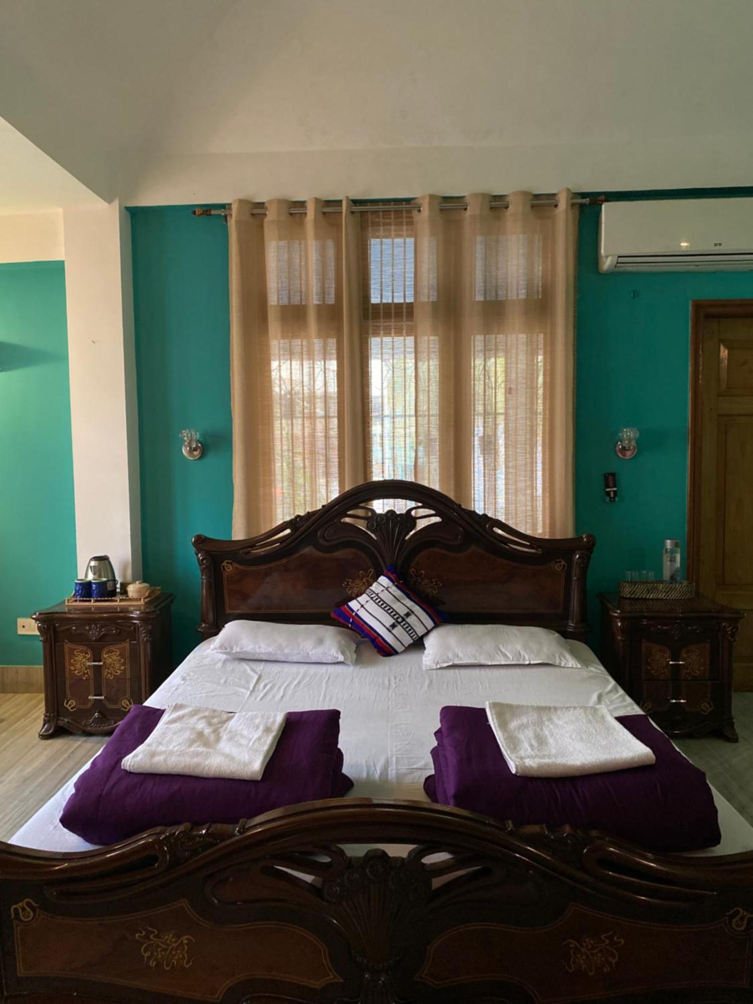 Assam Home Hostel Project Guváhátí Pokoj fotografie