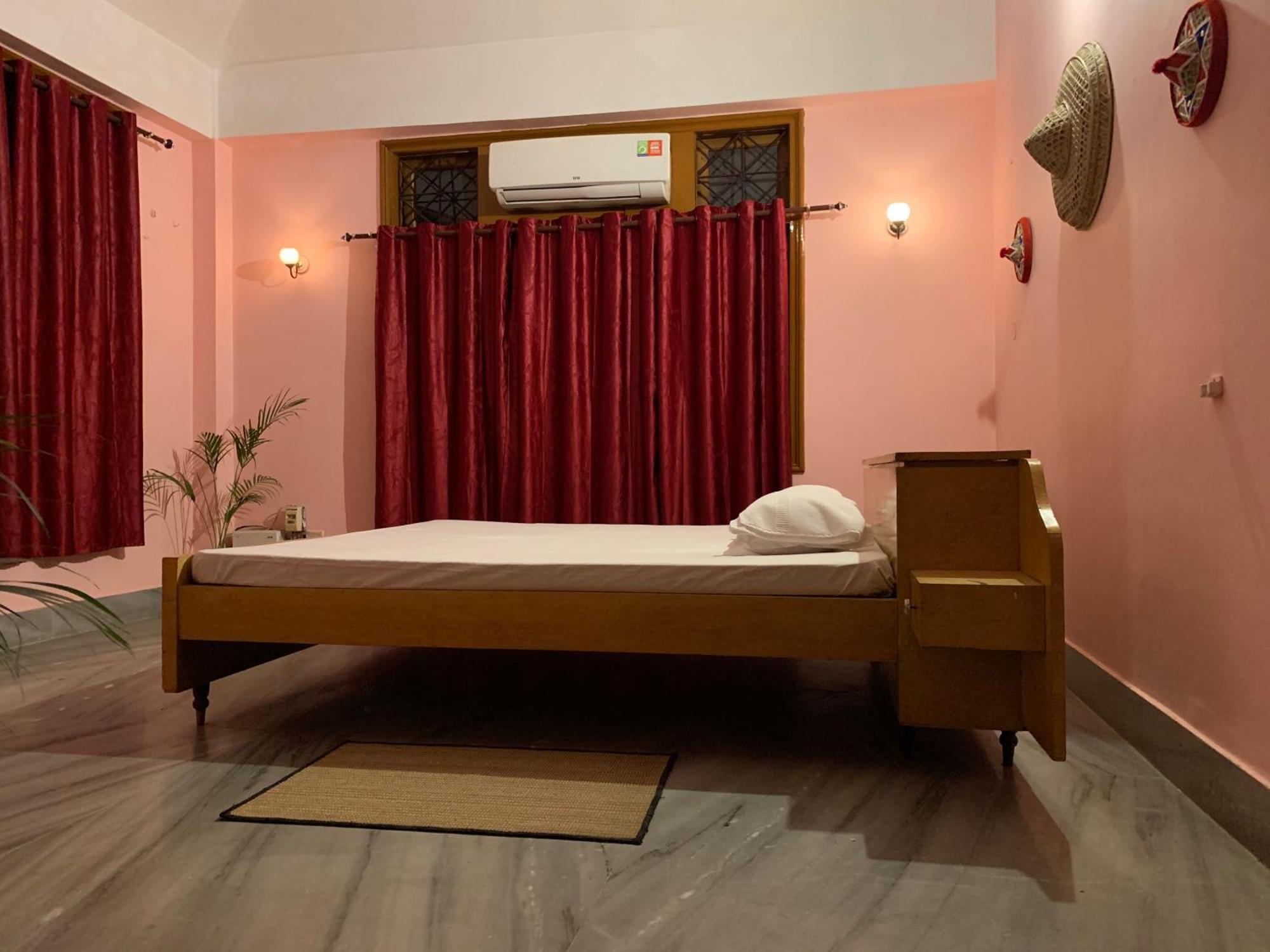 Assam Home Hostel Project Guváhátí Pokoj fotografie