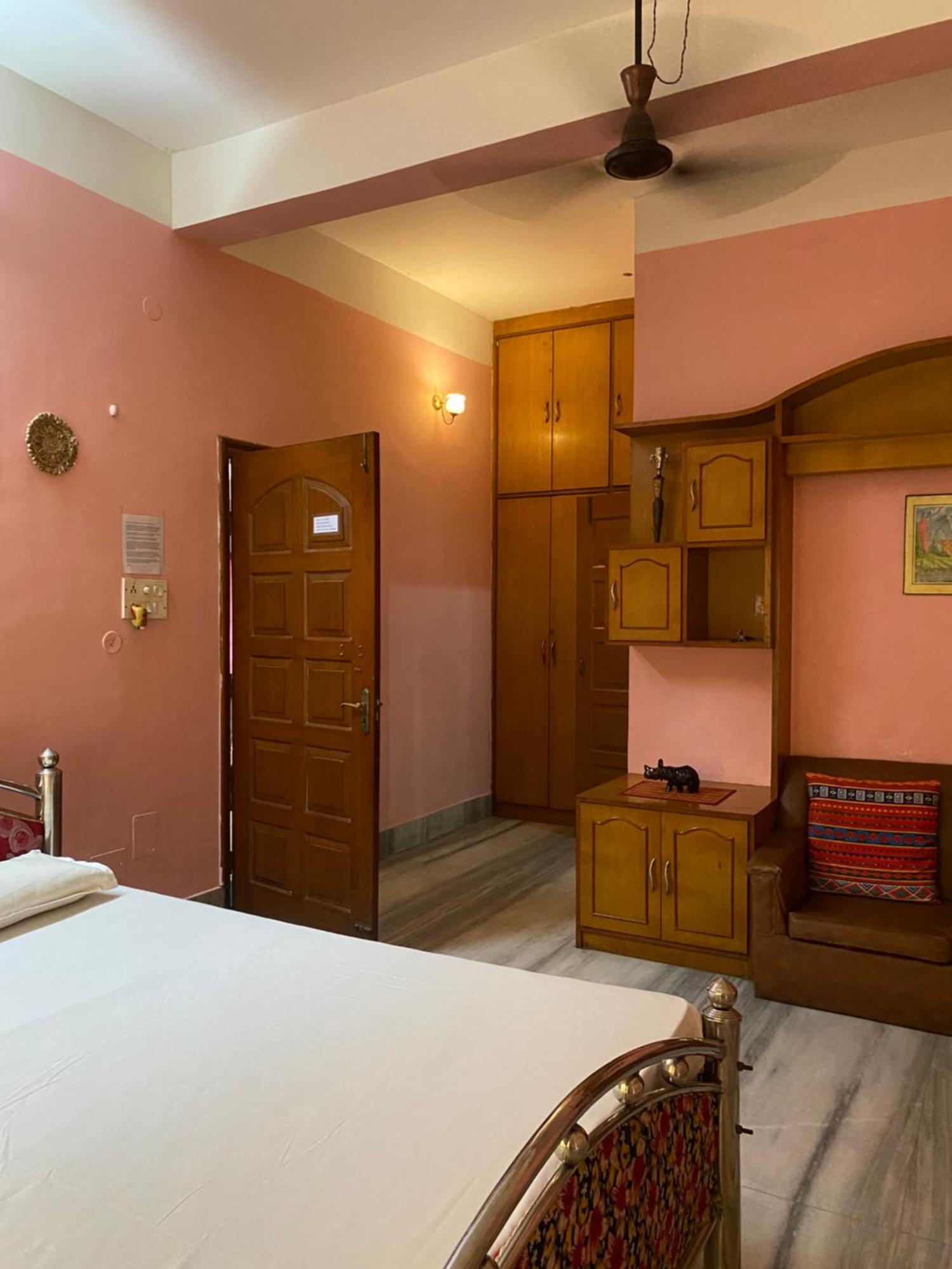 Assam Home Hostel Project Guváhátí Pokoj fotografie