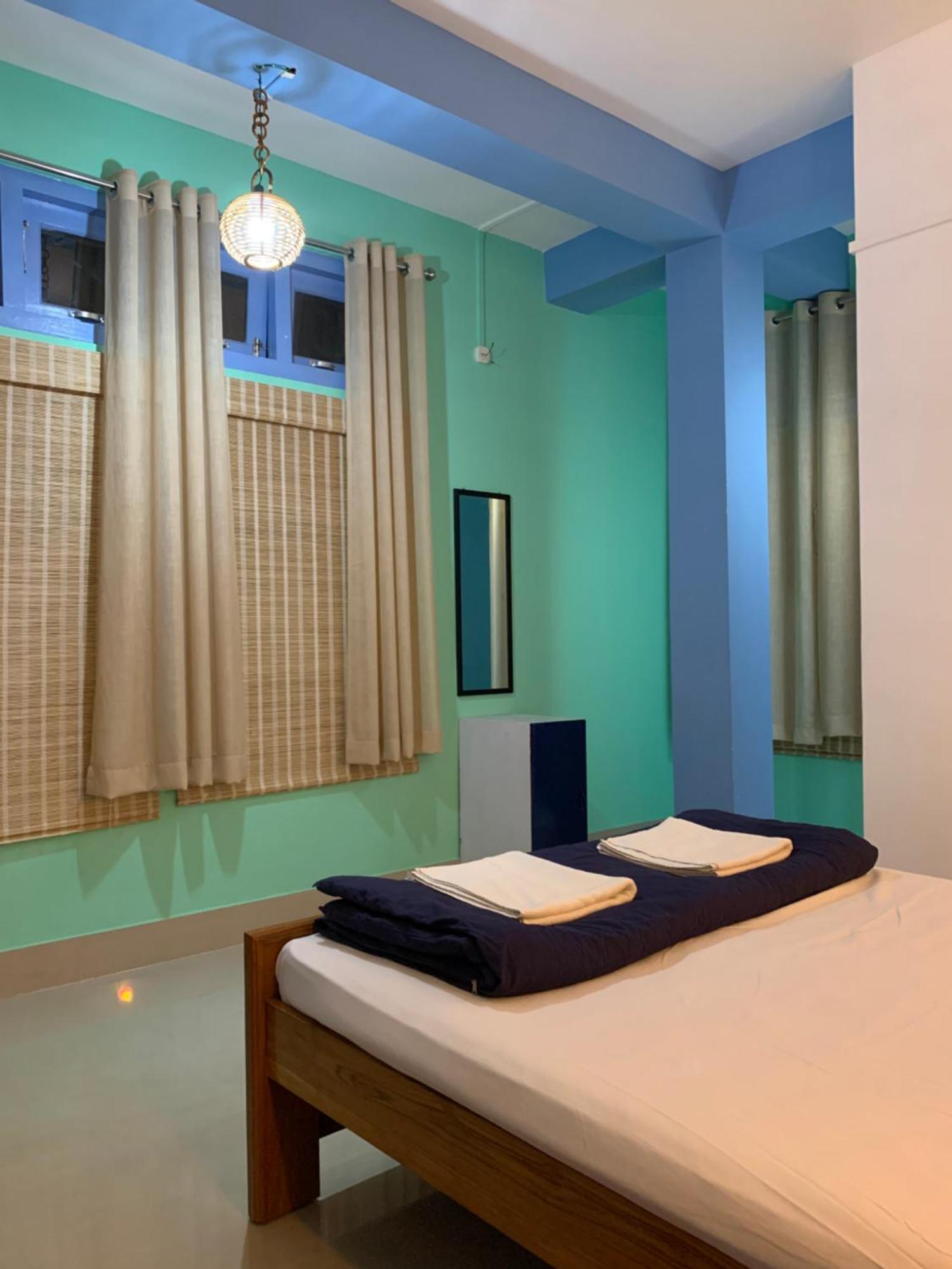 Assam Home Hostel Project Guváhátí Pokoj fotografie