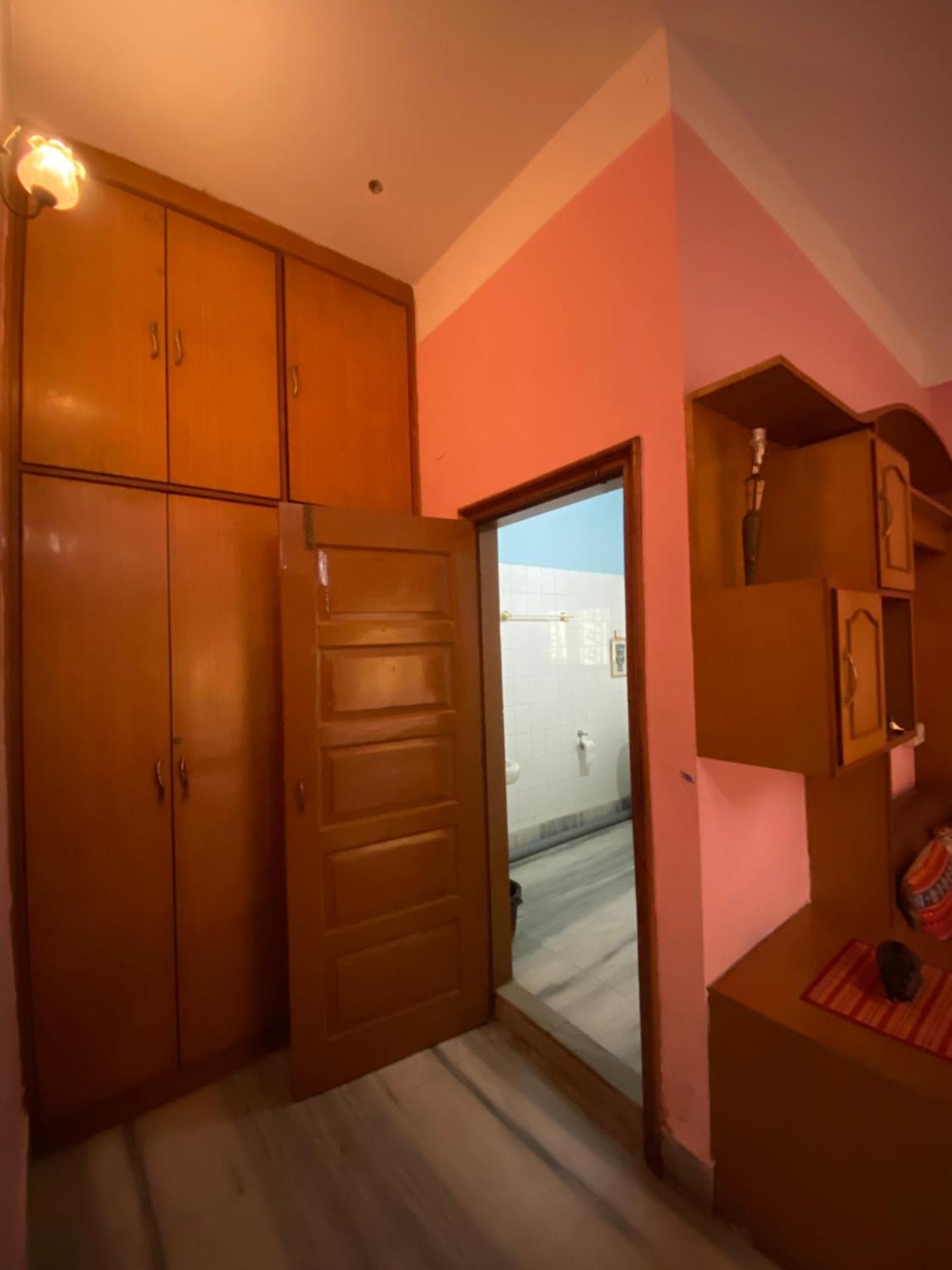 Assam Home Hostel Project Guváhátí Pokoj fotografie